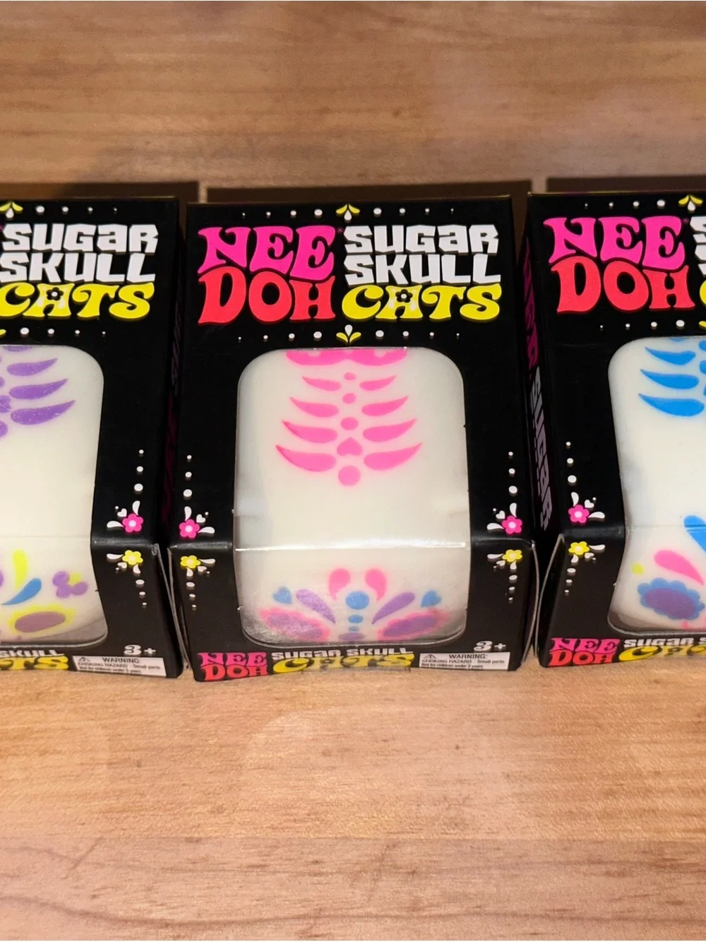 1 NeeDoh Sugar Skull Cat Squish- White with Pink, Purple or Blue Accents 4 Avail